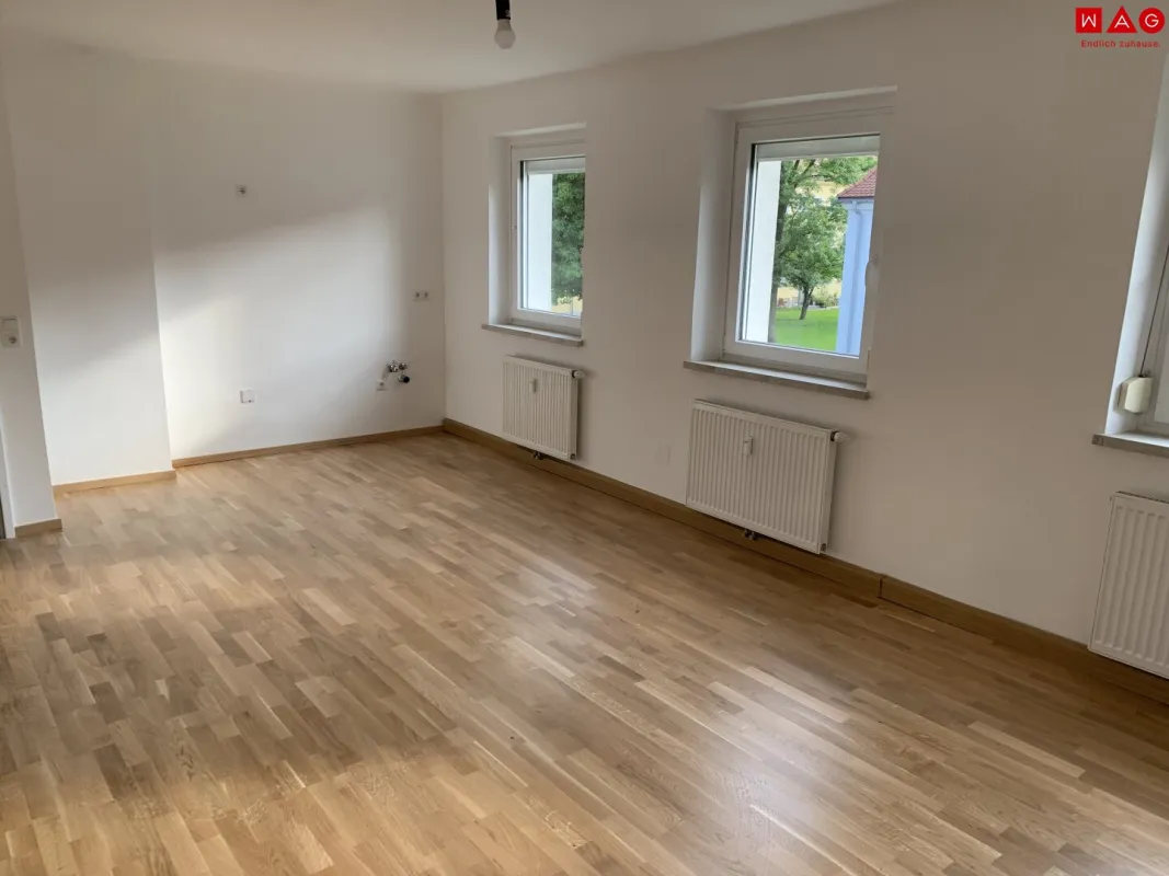 Diese Wohnung überzeugt mit stilvoller Sanierung; ebenerdige Dusche, hochwertige Böden und praktischer Grundriss - perfekt für Paare oder kleine Familien! - Bild 1