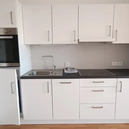 MITTEN IN DER STADT Ruhe auf der begrünten Terrasse genießen - 2 Zimmer Neubauwohnung - Bild 2