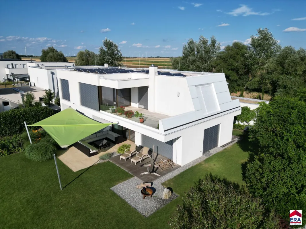 Moderne lichtdurchflutete Traumvilla in bester Lage am See - Bild 1