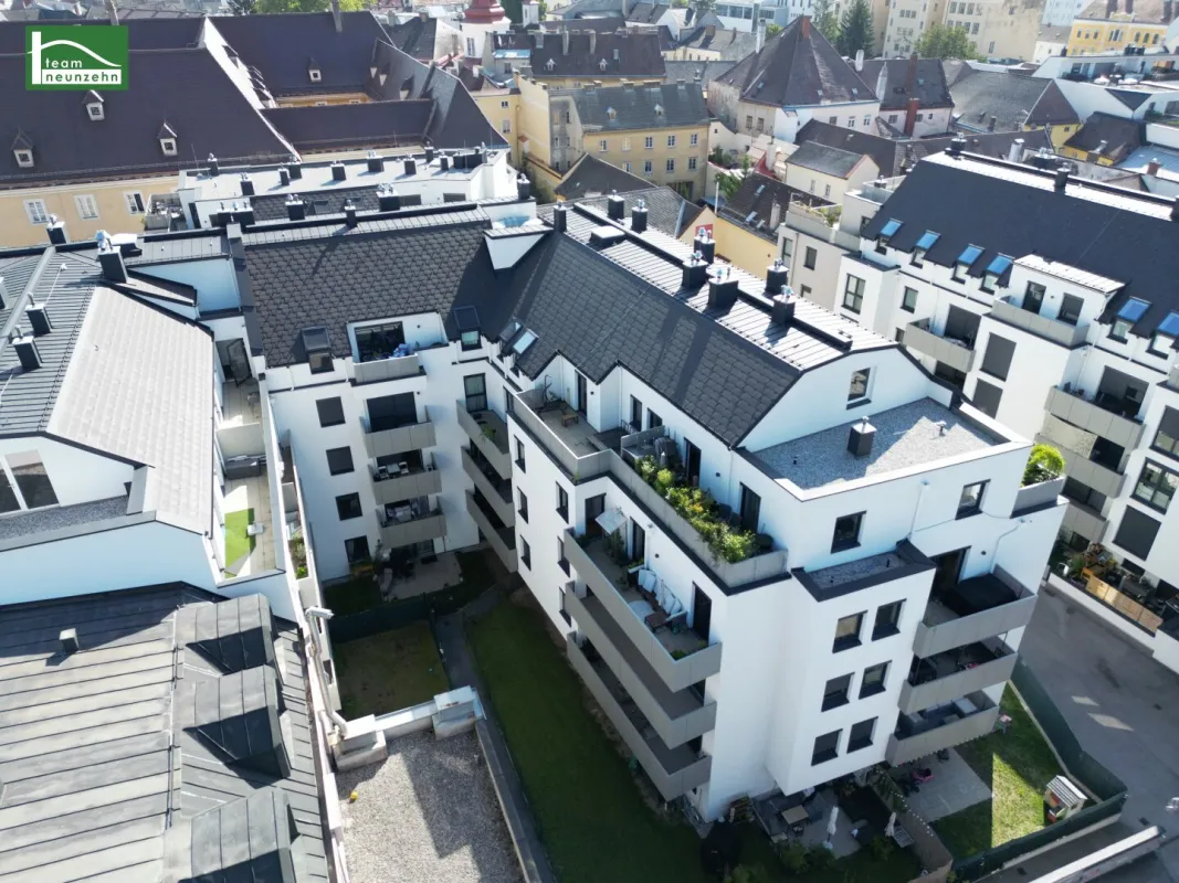 Moderne 3-Zimmer-Dachgeschosswohnung in idealer Lage! Karmeliterhof - Neubauwohntraum beim Rathausplatz - Bild 1