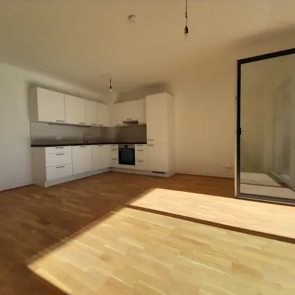 Moderne 3-Zimmer-Dachgeschosswohnung in idealer Lage! Karmeliterhof - Neubauwohntraum beim Rathausplatz - Bild 2