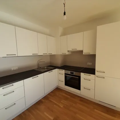 Moderne 3-Zimmer-Dachgeschosswohnung in idealer Lage! Karmeliterhof - Neubauwohntraum beim Rathausplatz - Bild 3