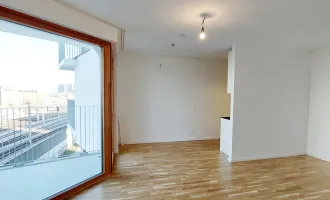 Sonnwendviertel: 1-Zimmer-Wohnung mit Balkon im 10. OG – Fitnessraum, Co-Working & Rooftop-Terrasse inklusive!
