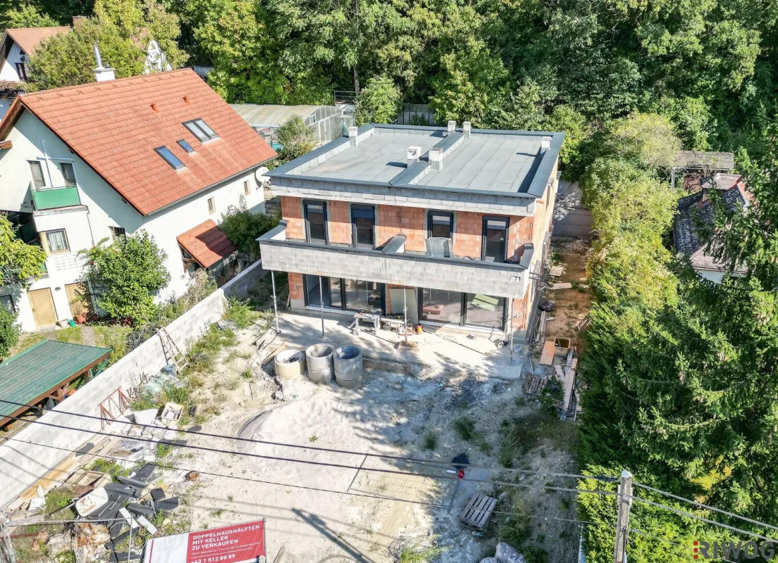 Neubau-Doppelhaus mit riesigem Garten und eigenem Waldstück | 4 Zimmer | Südseitiger Garten/Terrasse | Vollunterkellert | Luftwärmepumpe | Carport | 2 Einheiten verfügbar - Bild 1