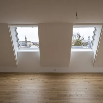 Traumhafte Dachgeschosswohnung - zentral aber ruhig - Bild 3