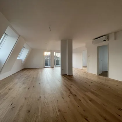 Traumhafte Dachgeschosswohnung - zentral aber ruhig - Bild 2