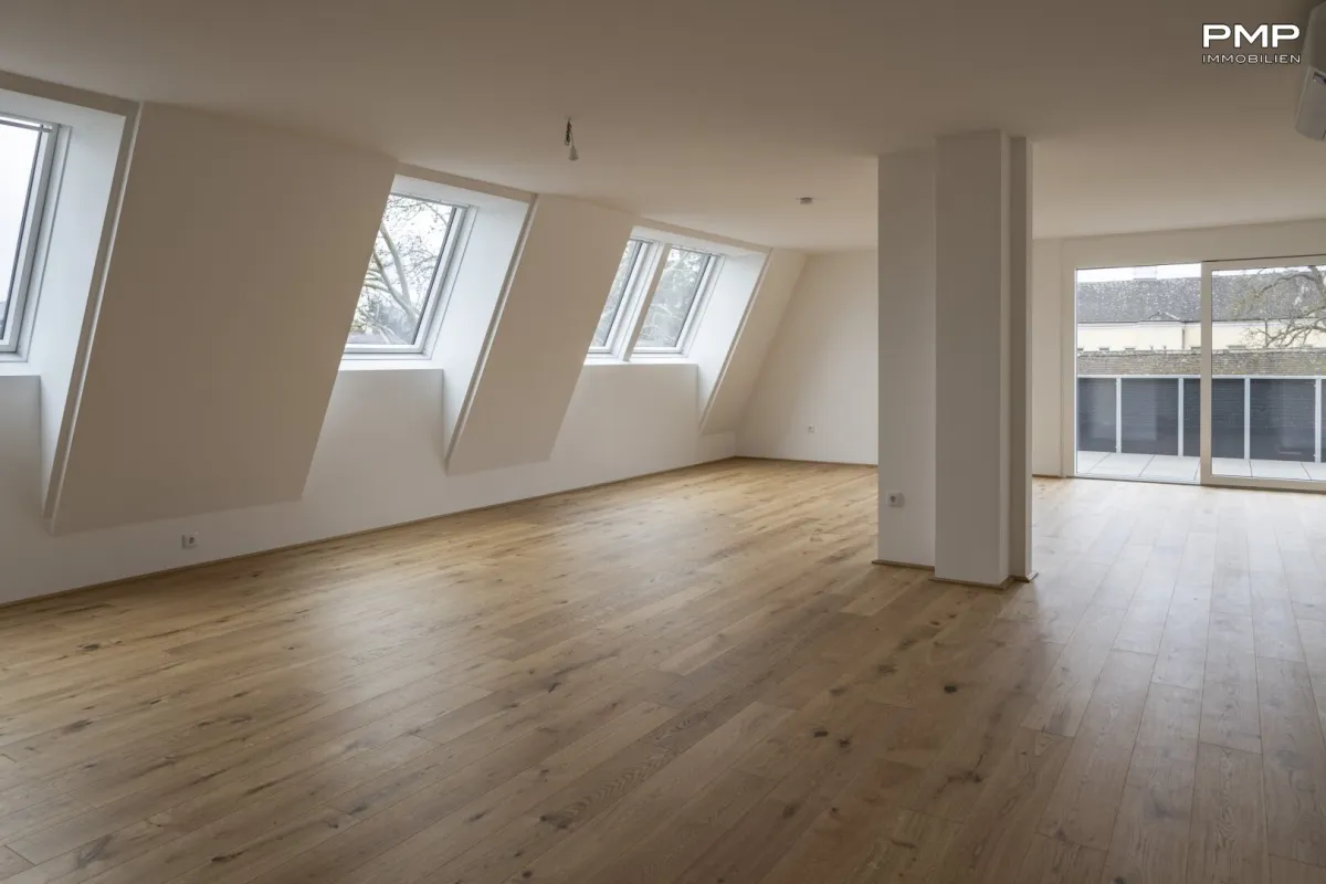 Traumhafte Dachgeschosswohnung - zentral aber ruhig - Bild 1