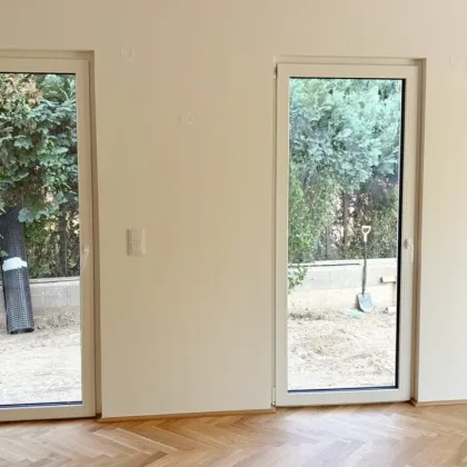 Moderne Architektur inmitten der Natur - Hochwertige 3-Zimmer Wohnung mit Garten und Terrasse! - Bild 3