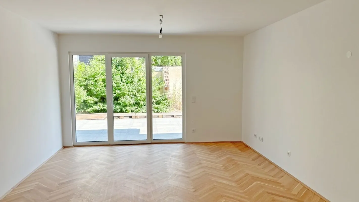 Moderne Architektur inmitten der Natur - Hochwertige 2-Zimmer Wohnung mit Garten und Terrasse! - Bild 1
