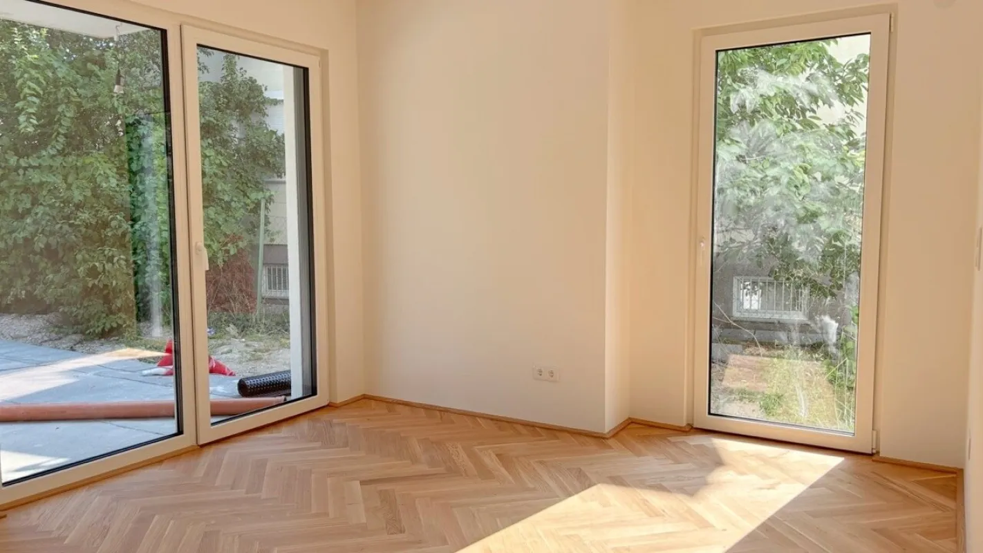 Moderne Architektur inmitten der Natur - Hochwertige 2-Zimmer Wohnung mit Garten und Terrasse! - Bild 1