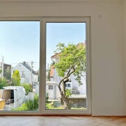 Moderne Architektur inmitten der Natur - Hochwertige 3-Zimmer Wohnung mit Balkon! - Bild 2