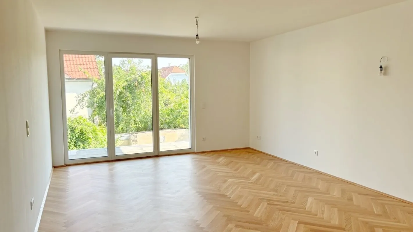 Moderne Architektur inmitten der Natur - Hochwertige 2-Zimmer Wohnung mit Balkon! - Bild 1
