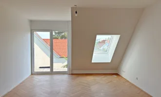 Moderne Architektur inmitten der Natur - Hochwertige Dachgeschoss 2-Zimmer Wohnung mit Balkon!