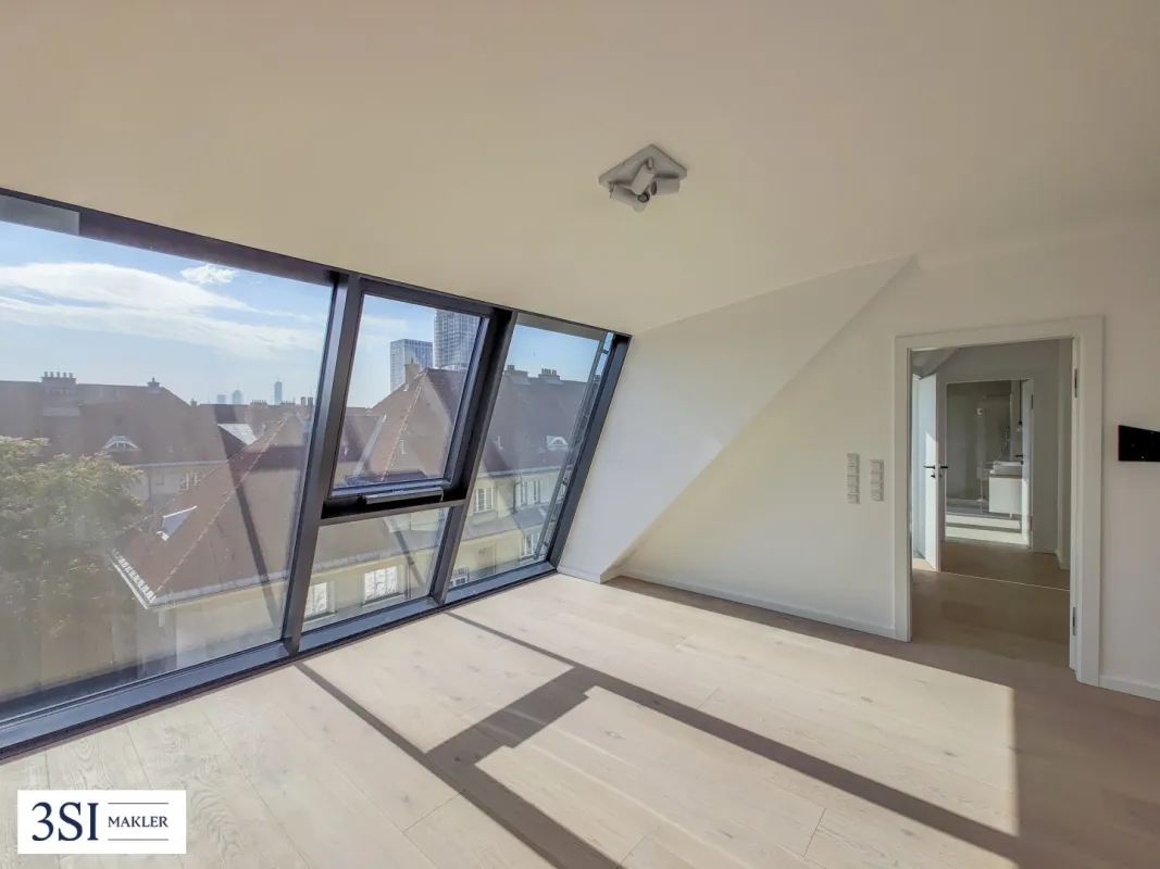 Modernes Wohnen im Altbau: Exklusiver Dachgeschossausbau mit Dachterrasse und Skyline-View! - Bild 1