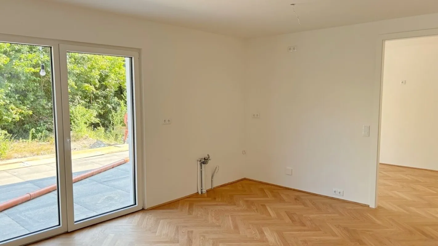 Moderne Architektur inmitten der Natur - Hochwertige 2-Zimmer Wohnung mit Garten und Terrasse! - Bild 1