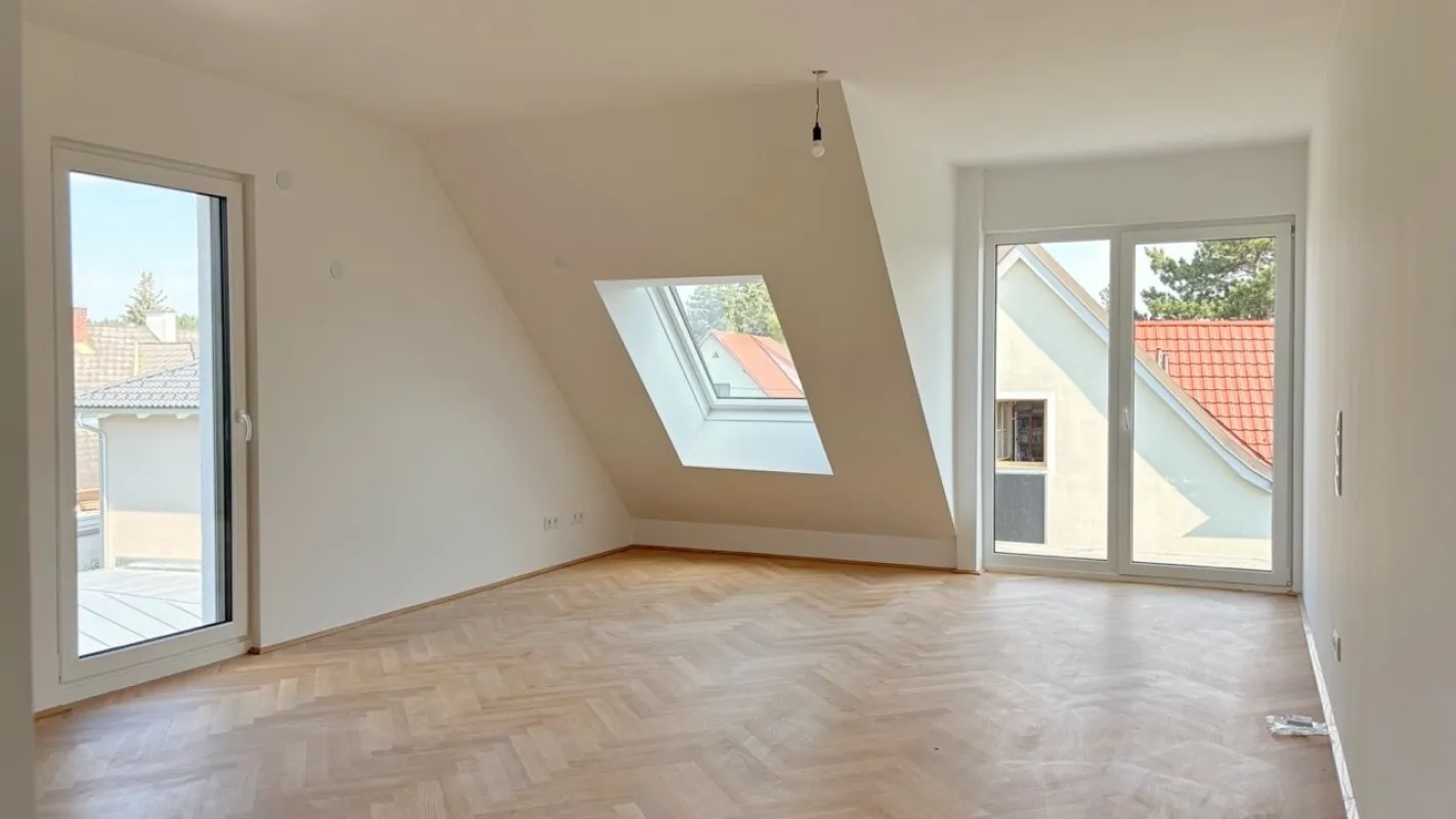 Moderne Architektur inmitten der Natur - Hochwertige Dachgeschoss 3-Zimmer Wohnung mit Balkon! - Bild 1