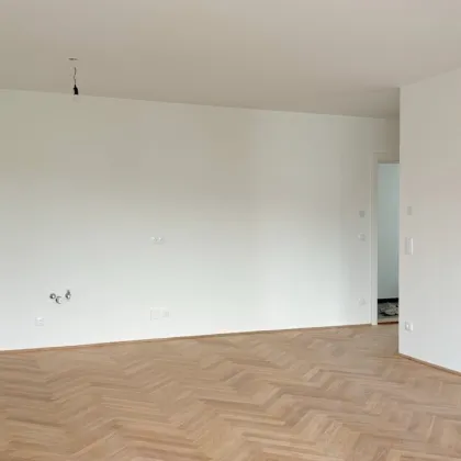 Moderne Architektur inmitten der Natur - Hochwertige Dachgeschoss 2-Zimmer Wohnung mit Balkon! - Bild 2