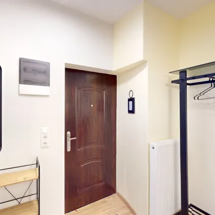 Charmante Erdgeschosswohnung in Finkenstein: 61 qm Wohnkomfort, 2 Schlafzimmer, stilvolles Wohn-Esszimmer, Parkettboden – Möbliert und renoviert, ein Zuhause zum Verlieben! - Bild 2