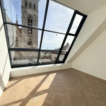 Spektakuläre Dachgeschoßmaisonette mit Terrassentraum und Blick auf die Canisiuskirche - Bild 3