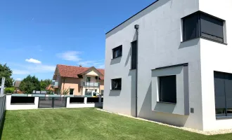 Design-Einfamilienhaus mit gehobener Ausstattung in 2441 Mitterndorf: 198 m², 4 Zimmer, neuwertig, Garten, Garage u.v.m.