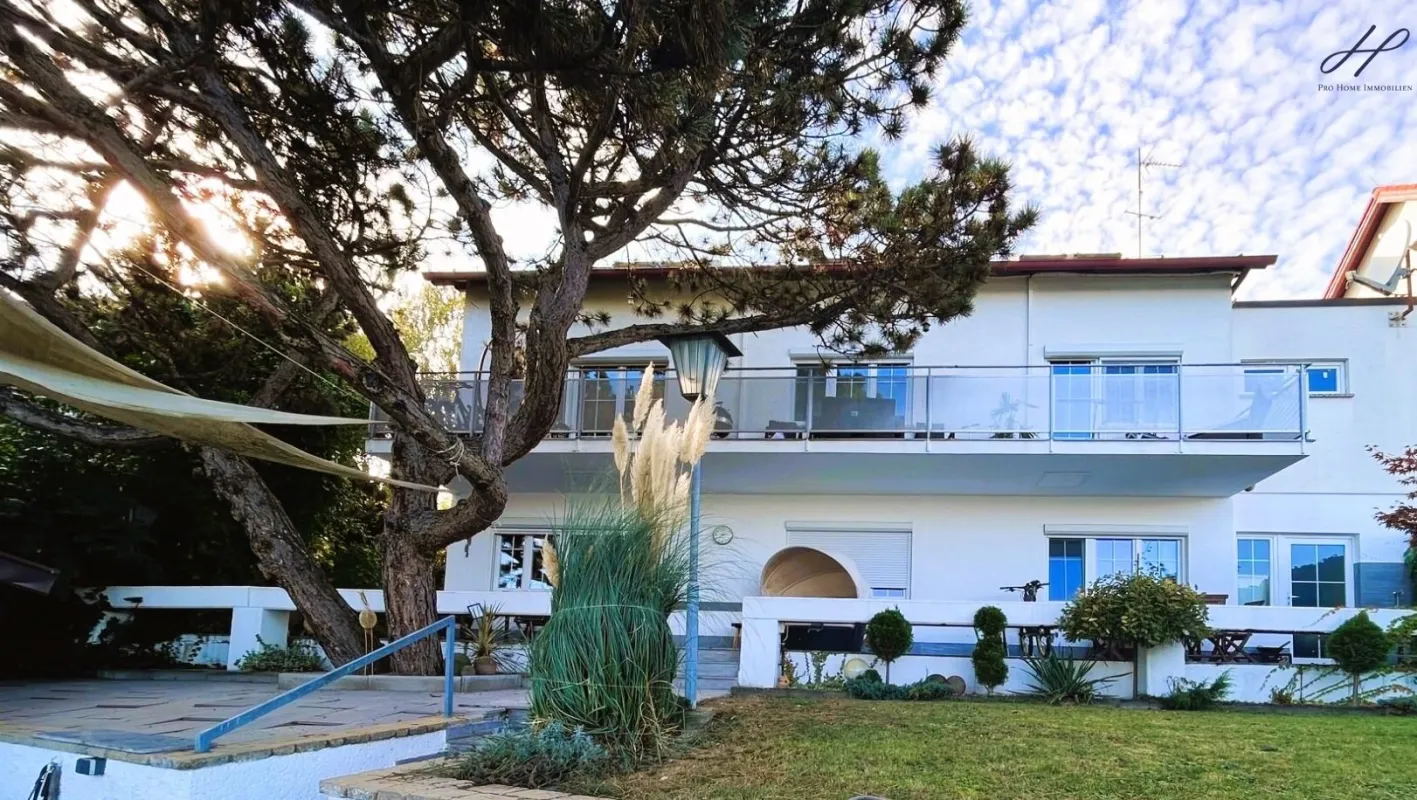 Dreifamilienhaus mit eigenem Seezugang in Leopoldsdorf bei Wien. - Bild 1