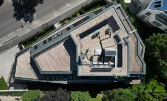Exklusive Dachgeschoß-Wohnung mit beeindruckender Terrasse - ERSTBEZUG!