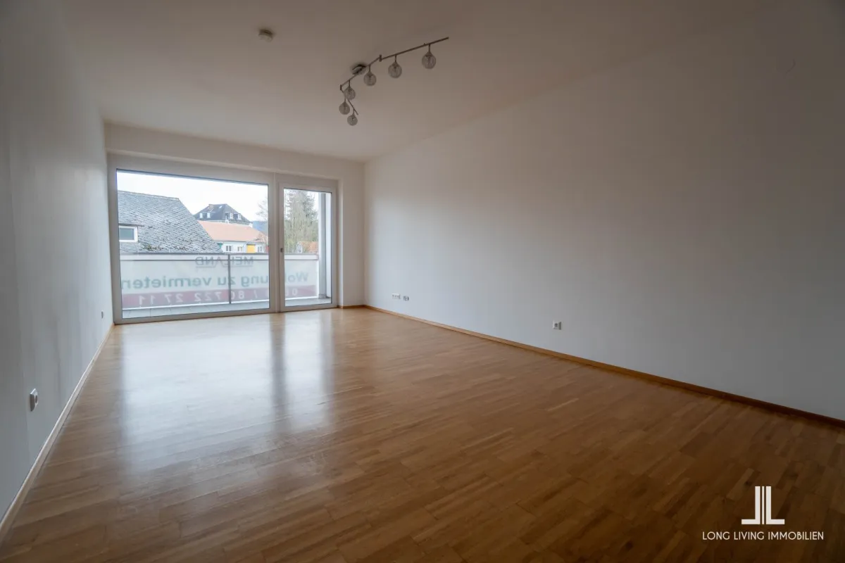 Moderne 2-Zimmer-Wohnung mit Balkon und Carport in zentraler Lage zum Spitzenpreis - Bild 1