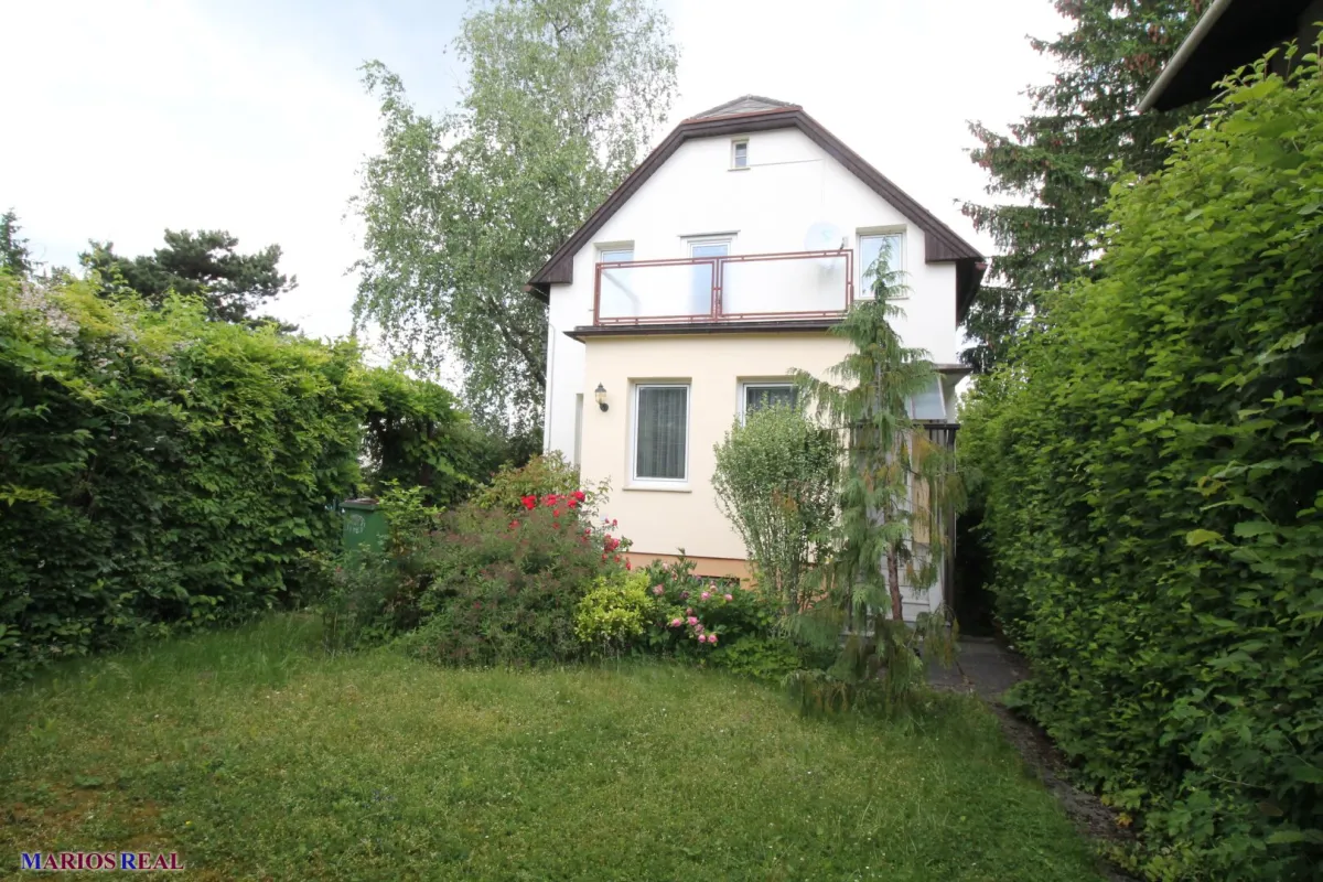 Einfamilienhaus mit Garten und Garage in begehrter Lage von Wien! - Bild 1