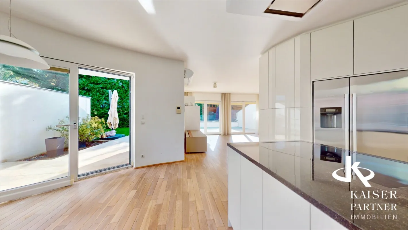 Modernes Wohnen in Wiens grüner Oase - Lichtdurchflutetes Haus mit Topterrasse und Weitblick! - Bild 1