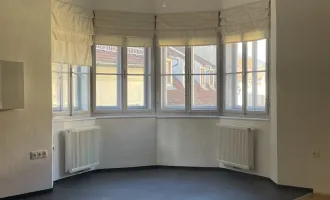 Attraktive Bürofläche in der Innenstadt mit Blick auf das Glockenspiel und den Uhrturm