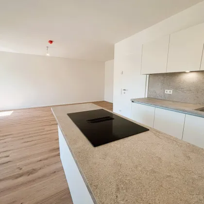 Erstbezug - Geräumige 3-Raum-Wohnung mit 2 Balkonen und Einbauküche mit herrlichem Blick in die Natur! - Mietkauf - Bild 3
