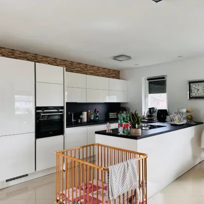 Attraktive Wohnung mit Garten und sonniger Dachterrasse - Bild 3