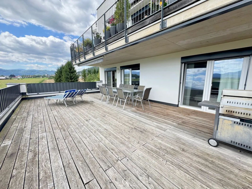 Traumhafte Eigentumswohnung mit riesiger Südwestterrasse und Carportstellplatz - Bild 1