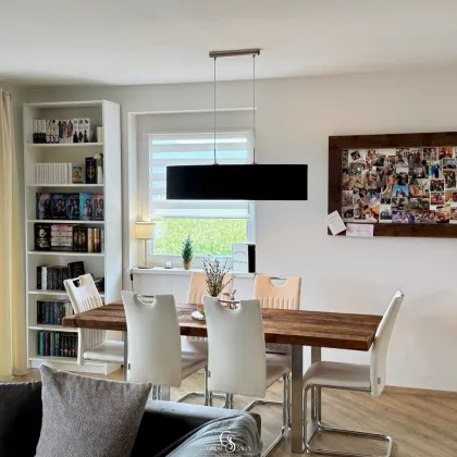 Traumhafte Eigentumswohnung mit riesiger Südwestterrasse und Carportstellplatz - Bild 3