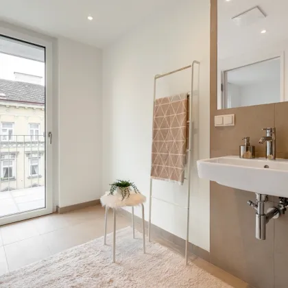 ERSTBEZUG | 2-Zimmer Neubau mit Balkon | Fernwärme | TG-Stellplatz optional | Nachhaltiges Wohnbauprojekt - Bild 2