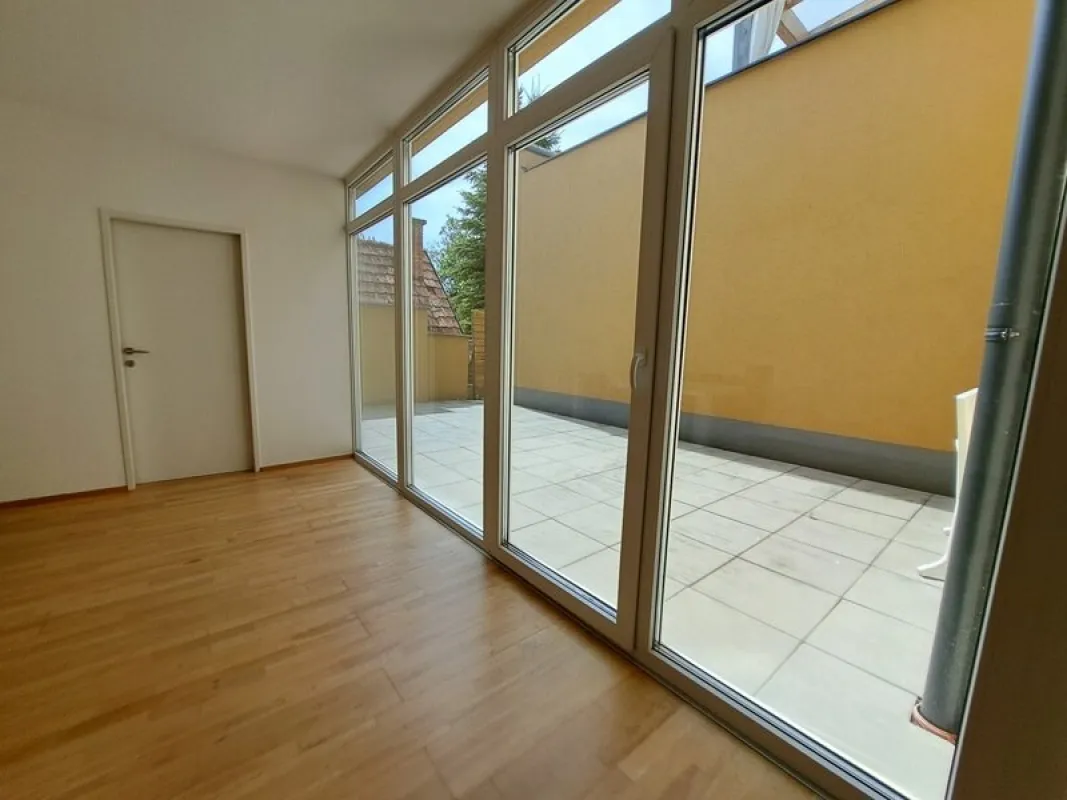 Sehr gut vermietete 4-Zimmer-Erdgeschosswohnung mit großer Terrasse - Bild 1