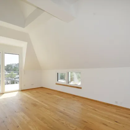Wunderschöne Dachgeschosswohnung mit Eigengarten - Bild 2