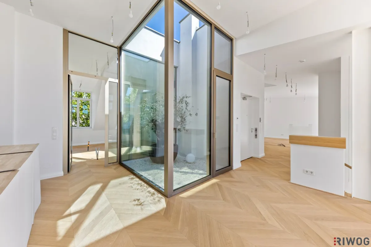 3,7m Raumhöhe im DG, Garage mit 2 Stellplätze, Atrium, Aufzug in die Wohnung und 360° Dachterrasse - Bild 1