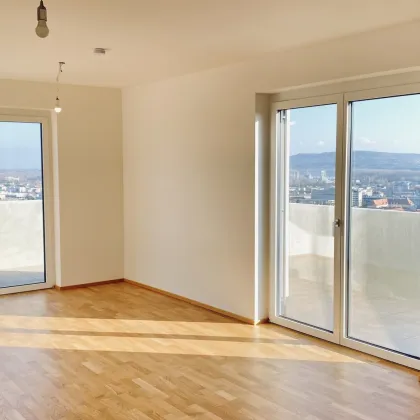 Neubau Erstbezug Sonnige Drei Zimmer Wohnung mit geräumiger Außenfläche und Fernblick - Bild 3
