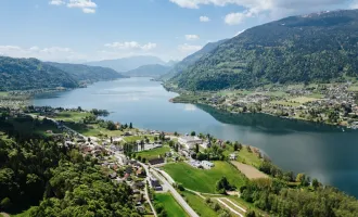 Exklusives Baugrundstück mit Seeblick und Freizeitwohnsitzwidmung – Rarität am Ossiacher See