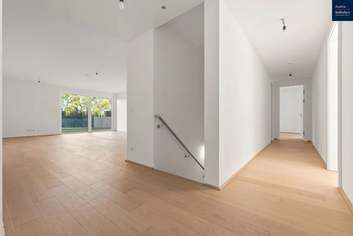 Wohn(T)raum am Wasser: Einzigartige Luxuswohnung mit Blick ins Grüne - Bild 1