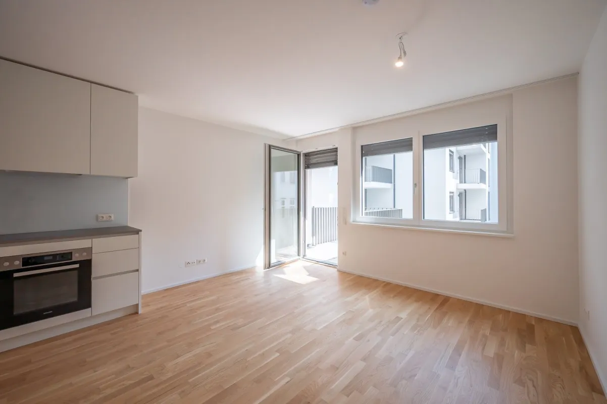 ASG IV-Qualitatives Wohnen in urbaner Lage: hochwertiger 1-Zimmer ERSTBEZUG mit Balkon! Tischler-Einbaumöbel! +Provisionsfrei+ - Bild 1