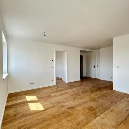 Erstklassige 73.8m² Wohnung mit Balkon in Mannswörth, Perfekt für Erstbezug! - Bild 2