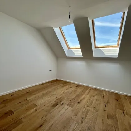 Traumhafte Erstbezug-Wohnung in Mannswörth - Modernes Design, erstklassige Ausstattung - Bild 3