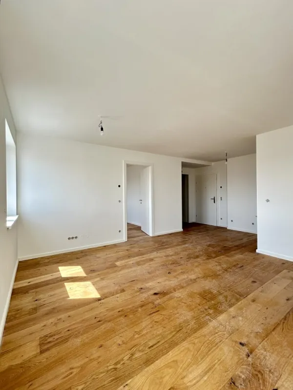 Moderne Traumwohnung mit Balkon in Mannswörth - Erstbezug, top Ausstattung - Bild 1