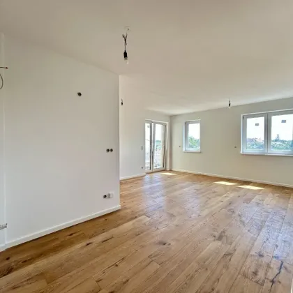 Moderne Traumwohnung mit Balkon in Mannswörth - Erstbezug, top Ausstattung - Bild 2