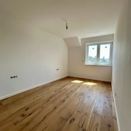 Erstklassige 73.8m² Wohnung mit Balkon in Mannswörth, Perfekt für Erstbezug! - Bild 2