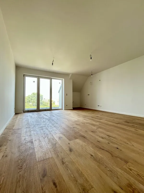 Erstklassige 73.8m² Wohnung mit Balkon in Mannswörth, Perfekt für Erstbezug! - Bild 1