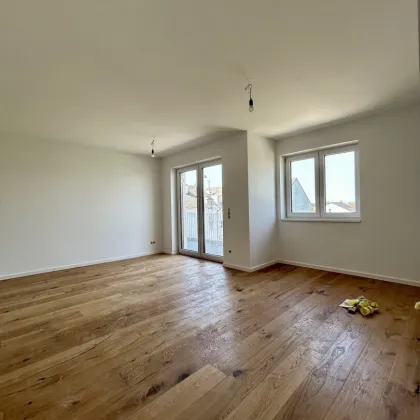 Modernes Wohnen in Mannswörth - Erstbezug mit Balkon und hochwertiger Ausstattung - Bild 3