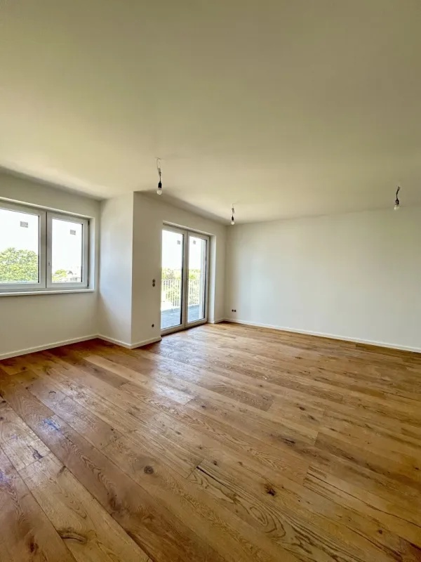 Traumhafte Erstbezug-Wohnung mit Balkon in Mannswörth - Bild 1